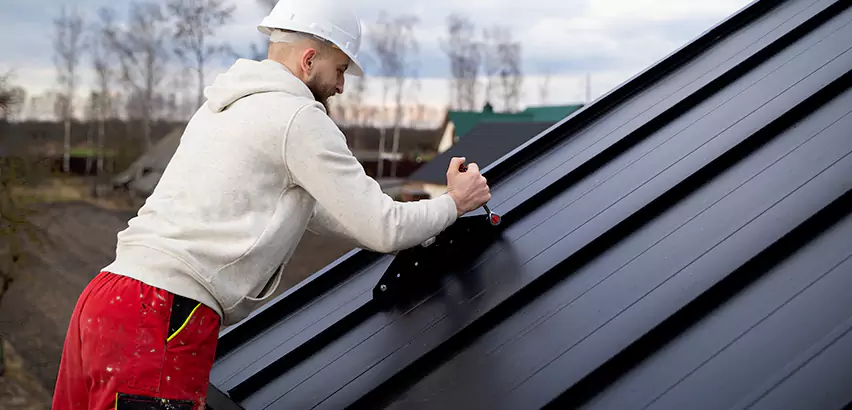 Tin Roof Ridge Cap Installation in University Place